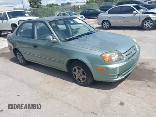 2004 Hyundai Accent GL z VIN KMHCG45C54U540120, wystawiony jako IAAI lot #42469965 z przebiegiem 114 639 mil mil oraz . Historia ofert i sprzedaży dostępna na DreamBid. Obrazek 1.