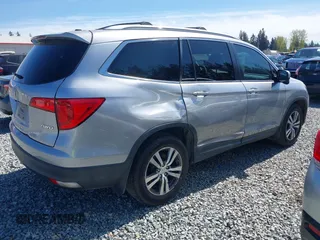 2016 Honda Pilot EX with VIN 5FNYF6H35GB001112, listed as a IAAI auction lot 42040410 with 206,424 mi miles. Bid and sale history available at carsss.com. Image 4.