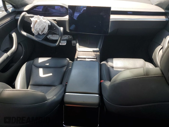 2023 Tesla Model S z VIN 5YJSA1E58PF500032, wystawiony jako Copart lot #57532955 z przebiegiem Nie podano mil oraz Szkoda całkowita • Salvage title. Historia ofert i sprzedaży dostępna na DreamBid. Obrazek 8.