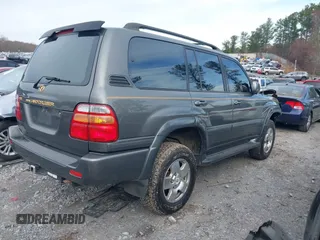 2001 Toyota Land Cruiser with VIN JTEHT05J012004269, listed as a IAAI auction lot 41037545 with 180,814 mi miles. Bid and sale history available at carsss.com. Image 4.