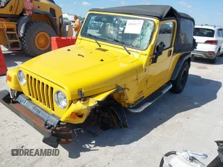 2004 Jeep Wrangler Sport with VIN 1J4FA49S64P759360, listed as a IAAI auction lot 42028277 with 176,880 mi miles and . Bid and sale history available at DreamBid. Image 18.