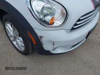 2014 MINI Countryman with VIN WMWZB3C5XEWR37594, listed as a IAAI auction lot 42500466 with 67,589 mi miles and . Bid and sale history available at DreamBid. Image 15.