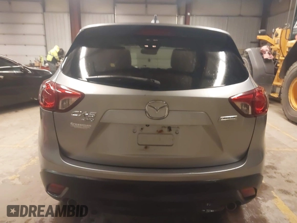 2014 Mazda CX-5 Grand Touring with VIN JM3KE4DY5E0305882, listed as a IAAI auction lot 41879532 with 173,443 mi miles. Bid and sale history available at carsss.com. Image 16.