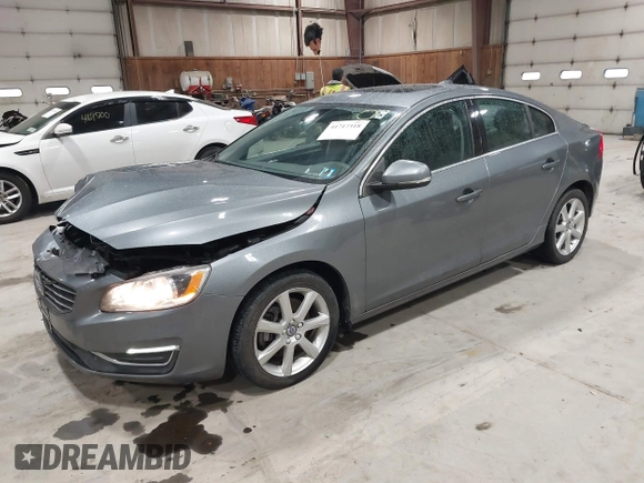 2016 Volvo S60 T5 Premier z VIN YV1612TK0G2410743, wystawiony jako IAAI lot #41717318 z przebiegiem 87 087 mil mil oraz . Historia ofert i sprzedaży dostępna na DreamBid. Obrazek 17.