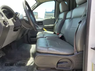 2005 Ford F-150 XL with VIN 1FTRF12255NB53669, listed as a Copart auction lot 61636135 with 156,562 mi miles and Salvage title. Bid and sale history available at DreamBid. Image 7.