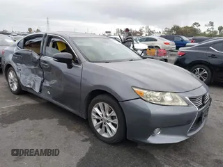 2013 Lexus ES 300h with VIN JTHBW1GG5D2017997, listed as a IAAI auction lot 42185265 with 166,383 mi miles and . Bid and sale history available at DreamBid. Image 1.