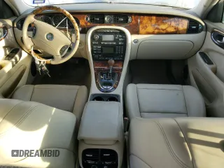 2004 Jaguar XJ with VIN SAJWA71CX4SG21334, listed as a Copart auction lot 70946034 with 0 mi miles and Clean Title. Bid and sale history available at carsss.com. Image 8.