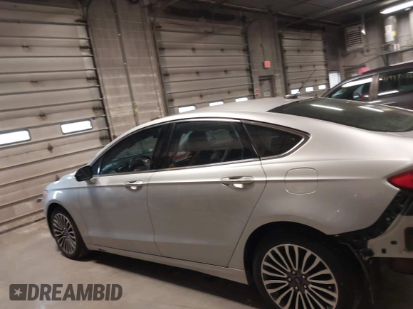 2018 Ford Fusion Titanium with VIN 3FA6P0D91JR138698, listed as a IAAI auction lot 41992522 with 95,017 mi miles and . Bid and sale history available at DreamBid. Image 15.