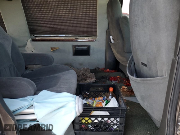 2002 Chevrolet Chevy Van с VIN 1GBFG15M721222513, выставлен на аукционе Copart как лот 41666265 с пробегом Не указан миль и Списание • Salvage title. История ставок и продаж доступна на DreamBid. Изображение 11.