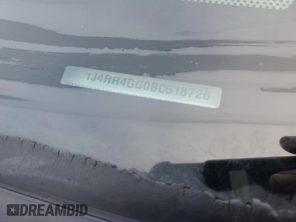 2011 Jeep Grand Cherokee Laredo z VIN 1J4RR4GG0BC518726, wystawiony jako Copart lot #58985765 z przebiegiem 163 625 mil mil oraz Szkoda całkowita • Salvage title. Historia ofert i sprzedaży dostępna na DreamBid. Obrazek 13.