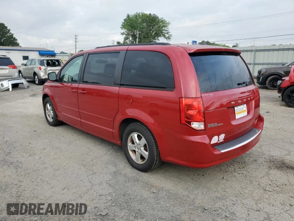 2012 Dodge Grand Caravan SXT with VIN 2C4RDGCG3CR236407, listed as a Copart auction lot 54771015 with 184,859 mi miles and Clean Title. Bid and sale history available at DreamBid. Image 2.