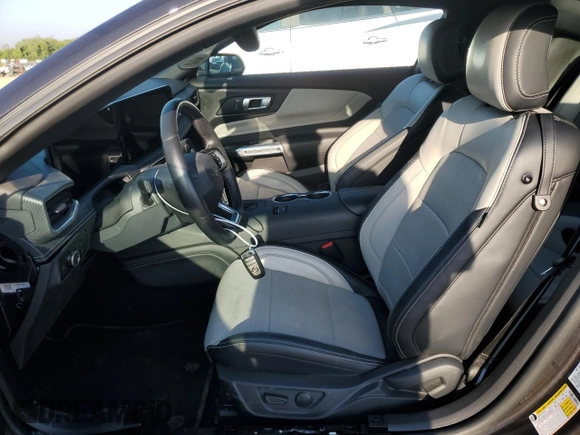2024 Ford Mustang EcoBoost with VIN 1FA6P8TH1R5132860, listed as a Copart auction lot 52870255 with 10,942 mi miles and Salvage Title. Bid and sale history available at DreamBid. Image 7.