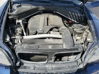 2013 BMW X5 xDrive35i with VIN 5UXZV4C50D0B09105, listed as a Copart auction lot 49385615 with 121,437 mi miles and Salvage Title. Bid and sale history available at carsss.com. Image 12.