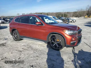 2019 BMW X1 sDrive28i with VIN WBXHU7C50K3H46236, listed as a Copart auction lot 45742165 with 102,335 mi miles and Salvage Title. Bid and sale history available at carsss.com. Image 4.