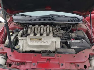 1997 Ford Taurus z VIN 1FALP54N7VA137035, wystawiony jako IAAI lot #41778551 z przebiegiem 137 025 mil mil oraz . Historia ofert i sprzedaży dostępna na DreamBid. Obrazek 10.