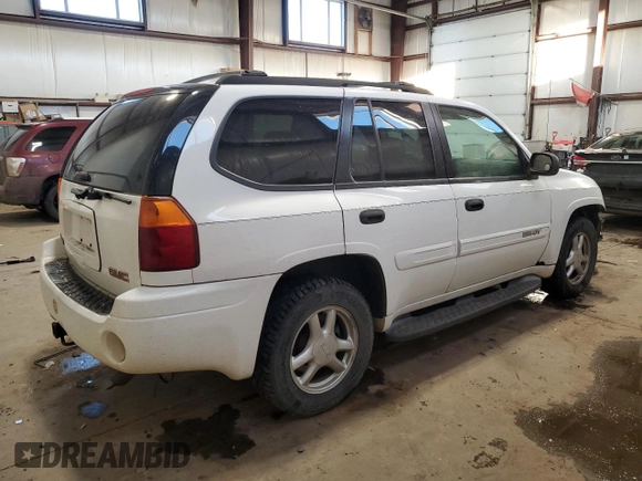 2004 GMC Envoy SLT with VIN 1GKDT13S042257444, listed as a Copart auction lot 89137605 with 301,920 mi miles and Salvage Title. Bid and sale history available at carsss.com. Image 3.