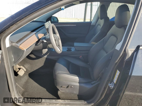 2024 Tesla Model Y Long Range z VIN 7SAYGAEE2RF075681, wystawiony jako Copart lot #86433524 z przebiegiem 18 640 mil mil oraz Szkoda całkowita • Salvage title. Historia ofert i sprzedaży dostępna na DreamBid. Obrazek 7.