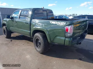 2021 Toyota Tacoma 4WD SR with VIN 3TMCZ5AN4MM401998, listed as a IAAI auction lot 41712813 with 91,371 mi miles. Bid and sale history available at carsss.com. Image 3.