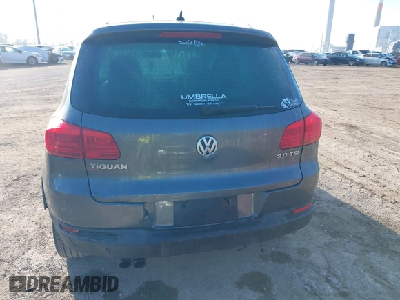 2012 Volkswagen Tiguan SEL with VIN WVGAV7AX2CW000962, listed as a IAAI auction lot 40815475 with 162,859 mi miles and . Bid and sale history available at DreamBid. Image 13.