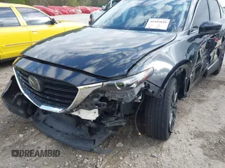 2022 Mazda CX-9 Touring Plus z VIN JM3TCBAYXN0613830, wystawiony jako IAAI lot #41942849 z przebiegiem 50 193 mil mil oraz . Historia ofert i sprzedaży dostępna na DreamBid. Obrazek 20.