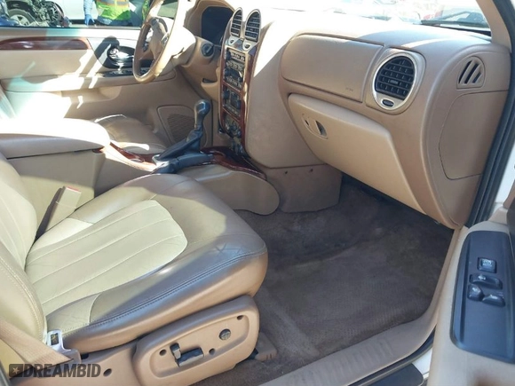 2002 GMC Envoy SLT with VIN 1GKDS13S522216498, listed as a IAAI auction lot 41642757 with 164,981 mi miles. Bid and sale history available at carsss.com. Image 5.