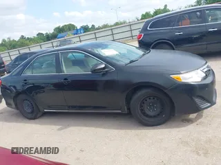2014 Toyota Camry L with VIN 4T1BF1FK8EU468379, listed as a IAAI auction lot 42134387 with 101,603 mi miles and . Bid and sale history available at DreamBid. Image 13.