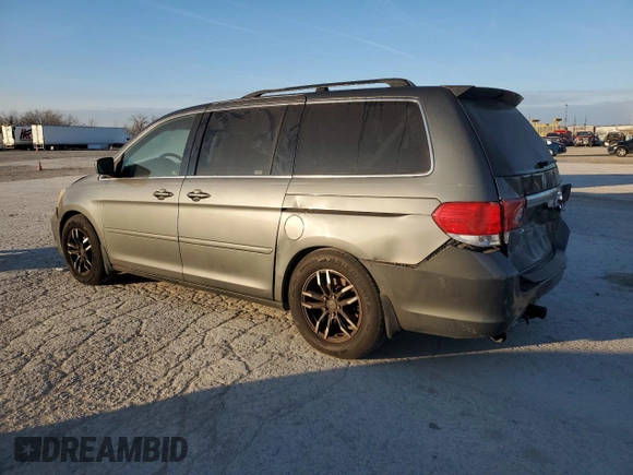 2008 Honda Odyssey Touring with VIN 5FNRL38848B060323, listed as a Copart auction lot 41422875 with 243,727 mi miles and Salvage Title. Bid and sale history available at carsss.com. Image 2.