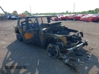 2015 Jeep Wrangler Unlimited Sport with VIN 1C4BJWDG8FL736241, listed as a IAAI auction lot 42395839 with Not provided miles and . Bid and sale history available at DreamBid. Image 1.