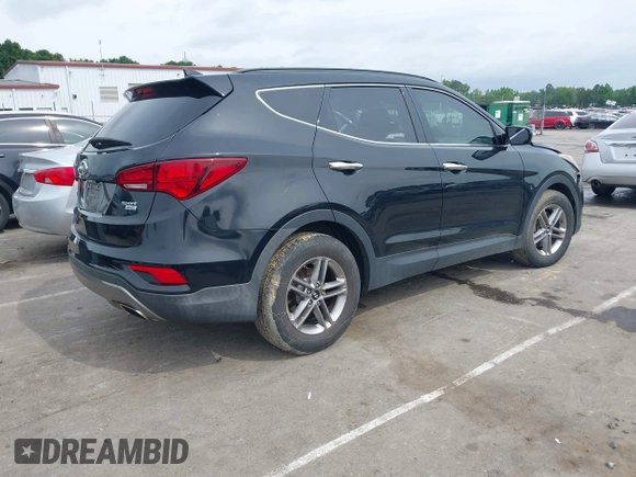 2017 Hyundai Santa Fe 2.4L with VIN 5NMZUDLB0HH037142, listed as a IAAI auction lot 42323880 with 87,396 mi miles and . Bid and sale history available at DreamBid. Image 4.