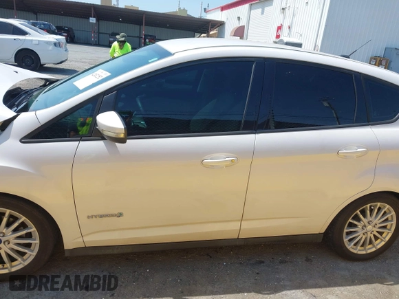 2013 Ford C-Max SE z VIN 1FADP5AU1DL518916, wystawiony jako IAAI lot #42452252 z przebiegiem 250 862 mil mil oraz . Historia ofert i sprzedaży dostępna na DreamBid. Obrazek 15.