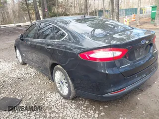 2015 Ford Fusion SE Hybrid with VIN 3FA6P0LU5FR190333, listed as a IAAI auction lot 41802327 with 256,747 mi miles. Bid and sale history available at carsss.com. Image 3.