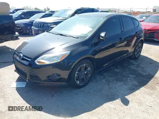2014 Ford Focus SE with VIN 1FADP3K29EL273107, listed as a IAAI auction lot 42083524 with 140,834 mi miles. Bid and sale history available at carsss.com. Image 2.