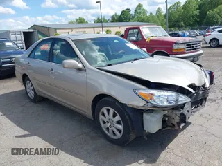 2002 Toyota Camry XLE z VIN 4T1BF30K02U534018, wystawiony jako IAAI lot #42203805 z przebiegiem 228 513 mil mil oraz . Historia ofert i sprzedaży dostępna na DreamBid. Obrazek 1.