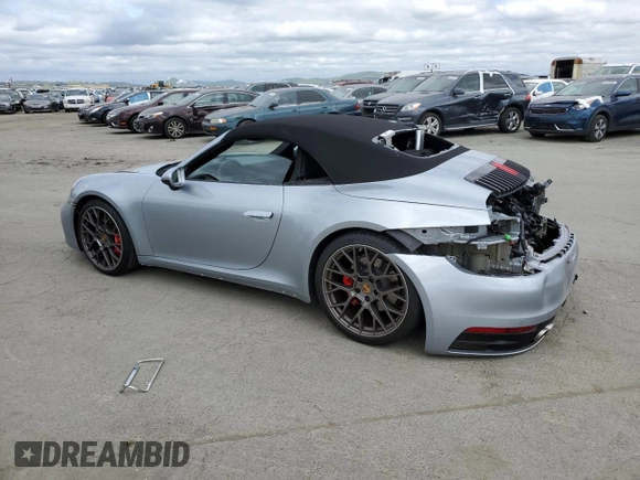 2020 Porsche 911 Carrera S z VIN WP0CB2A96LS263554, wystawiony jako Copart lot #52013384 z przebiegiem 8 702 mil mil oraz . Historia ofert i sprzedaży dostępna na DreamBid. Obrazek 2.