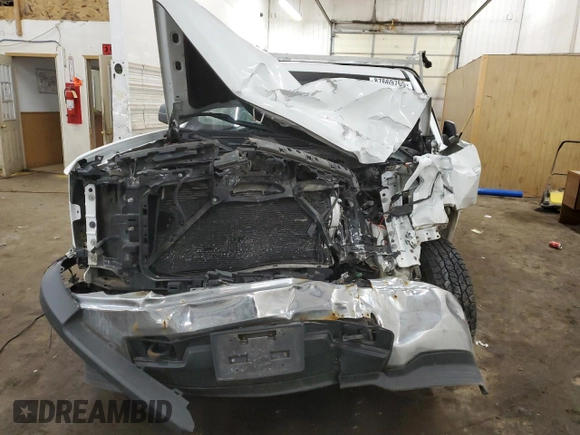 2014 Chevrolet Silverado 1500 Work Truck with VIN 1GCNKPEHXEZ324907, listed as a Copart auction lot 87669765 with 99,675 mi miles and Salvage Title. Bid and sale history available at DreamBid. Image 5.