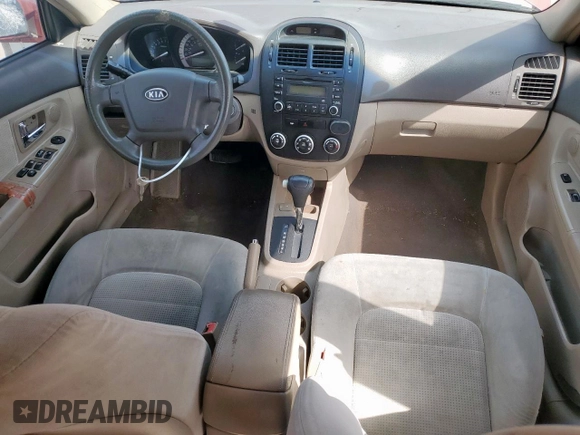 2007 Kia Spectra EX with VIN KNAFE122475378574, listed as a Copart auction lot 56921925 with 142,268 mi miles and Salvage title. Bid and sale history available at DreamBid. Image 8.