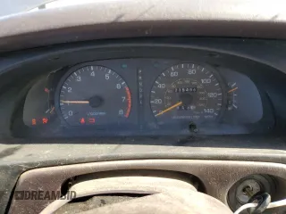 1996 Toyota Camry DX z VIN JT2BG12K7T0419839, wystawiony jako Copart lot #58267425 z przebiegiem 215 456 mil mil oraz Szkoda całkowita • Salvage title. Historia ofert i sprzedaży dostępna na DreamBid. Obrazek 9.