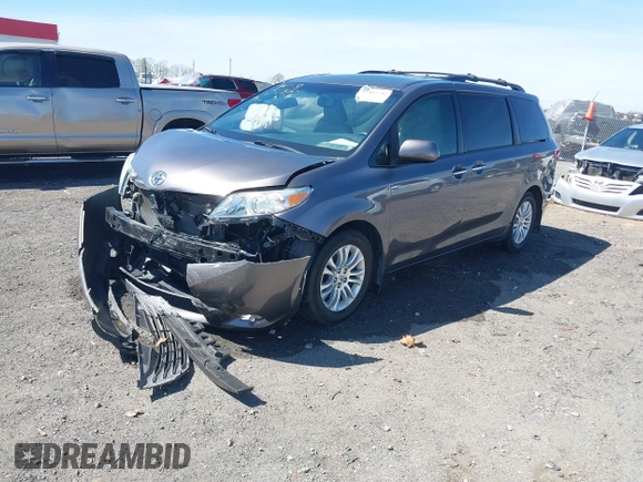 2015 Toyota Sienna XLE with VIN 5TDYK3DC4FS634937, listed as a IAAI auction lot 41869781 with 65,561 mi miles and . Bid and sale history available at carsss.com. Image 2.