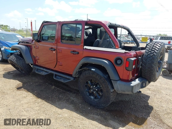 2021 Jeep Wrangler Unlimited Sport S with VIN 1C4HJXDN0MW815350, listed as a IAAI auction lot 42416714 with 68,869 mi miles and . Bid and sale history available at DreamBid. Image 3.