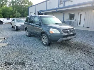 2005 Honda Pilot EX-L z VIN 2HKYF18705H564606, wystawiony jako Copart lot #55747785 z przebiegiem 272 432 mil mil oraz Szkoda całkowita • Salvage title. Historia ofert i sprzedaży dostępna na DreamBid. Obrazek 13.