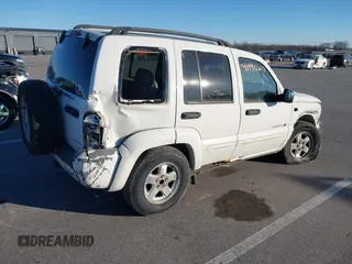 2003 Jeep Liberty Limited with VIN 1J8GL58K33W591945, listed as a IAAI auction lot 41446203 with 196,857 mi miles and . Bid and sale history available at DreamBid. Image 4.