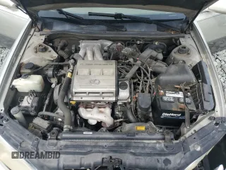 1998 Lexus ES 300 with VIN JT8BF28G4W5021187, listed as a Copart auction lot 60317445 with 258,403 mi miles and Salvage title. Bid and sale history available at DreamBid. Image 11.