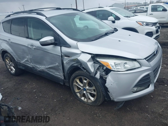 2013 Ford Escape SE with VIN 1FMCU0GX5DUA51847, listed as a IAAI auction lot 41897727 with 115,721 mi miles and . Bid and sale history available at DreamBid. Image 1.