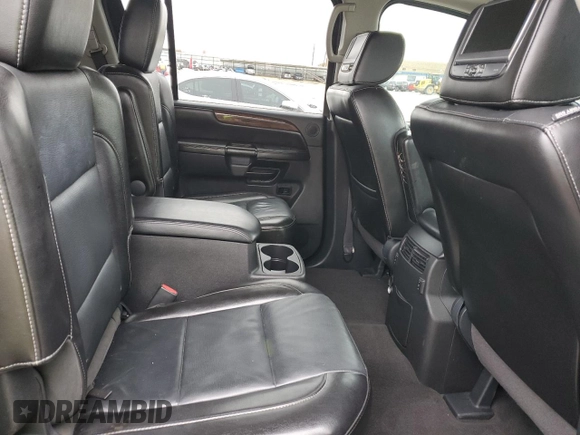2014 Nissan Armada Platinum z VIN 5N1BA0NF5EN601168, wystawiony jako Copart lot #44590395 z przebiegiem Nie podano mil oraz Szkoda całkowita • Salvage title. Historia ofert i sprzedaży dostępna na DreamBid. Obrazek 11.