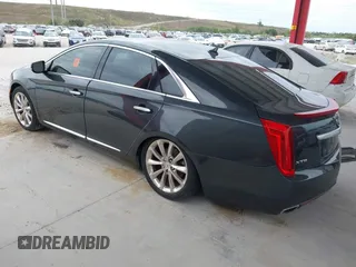 2014 Cadillac XTS Luxury with VIN 2G61M5S33E9217619, listed as a IAAI auction lot 41343003 with 126,303 mi miles. Bid and sale history available at carsss.com. Image 3.