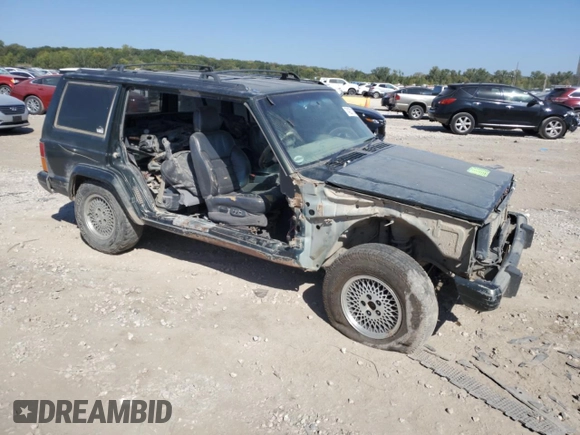 1995 Jeep Cherokee with VIN 1J4FN78S5SL557086, listed as a Copart auction lot 74221184 with 416,415 mi miles and Salvage title. Bid and sale history available at DreamBid. Image 4.