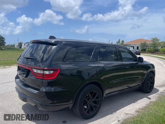 2016 Dodge Durango R/T with VIN 1C4SDHCT2GC476969, listed as a Copart auction lot 61194115 with 86,000 mi miles and Clean title. Bid and sale history available at DreamBid. Image 4.