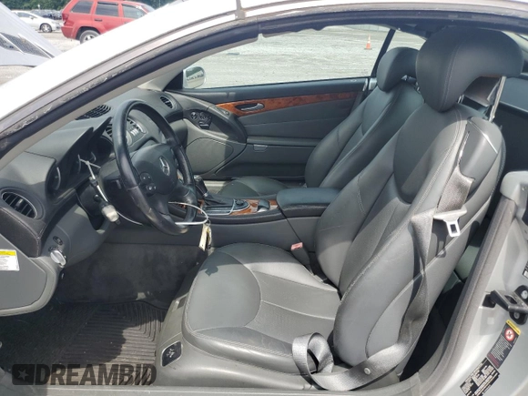 2005 Mercedes-Benz SL 500 with VIN WDBSK75F95F104935, listed as a Copart auction lot 60493705 with 89,994 mi miles and Salvage title. Bid and sale history available at DreamBid. Image 7.