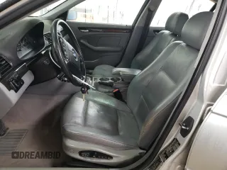 2000 BMW 3 Series 323i with VIN WBAAM3348YFP73443, listed as a Copart auction lot 54165575 with 334,761 mi miles and Salvage title. Bid and sale history available at DreamBid. Image 7.