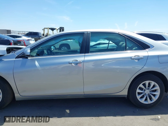 2016 Toyota Camry XLE with VIN 4T4BF1FK2GR539858, listed as a IAAI auction lot 42088911 with 49,488 mi miles and . Bid and sale history available at DreamBid. Image 14.